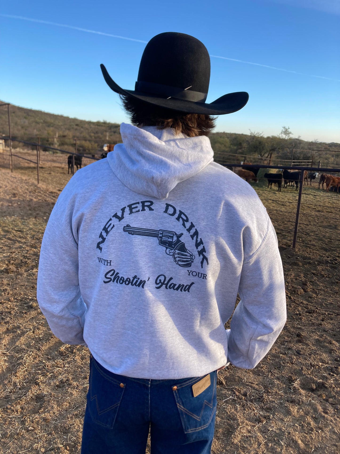 Never Drink With Your Shootin’ Hand Western Hooded Sweatshirt