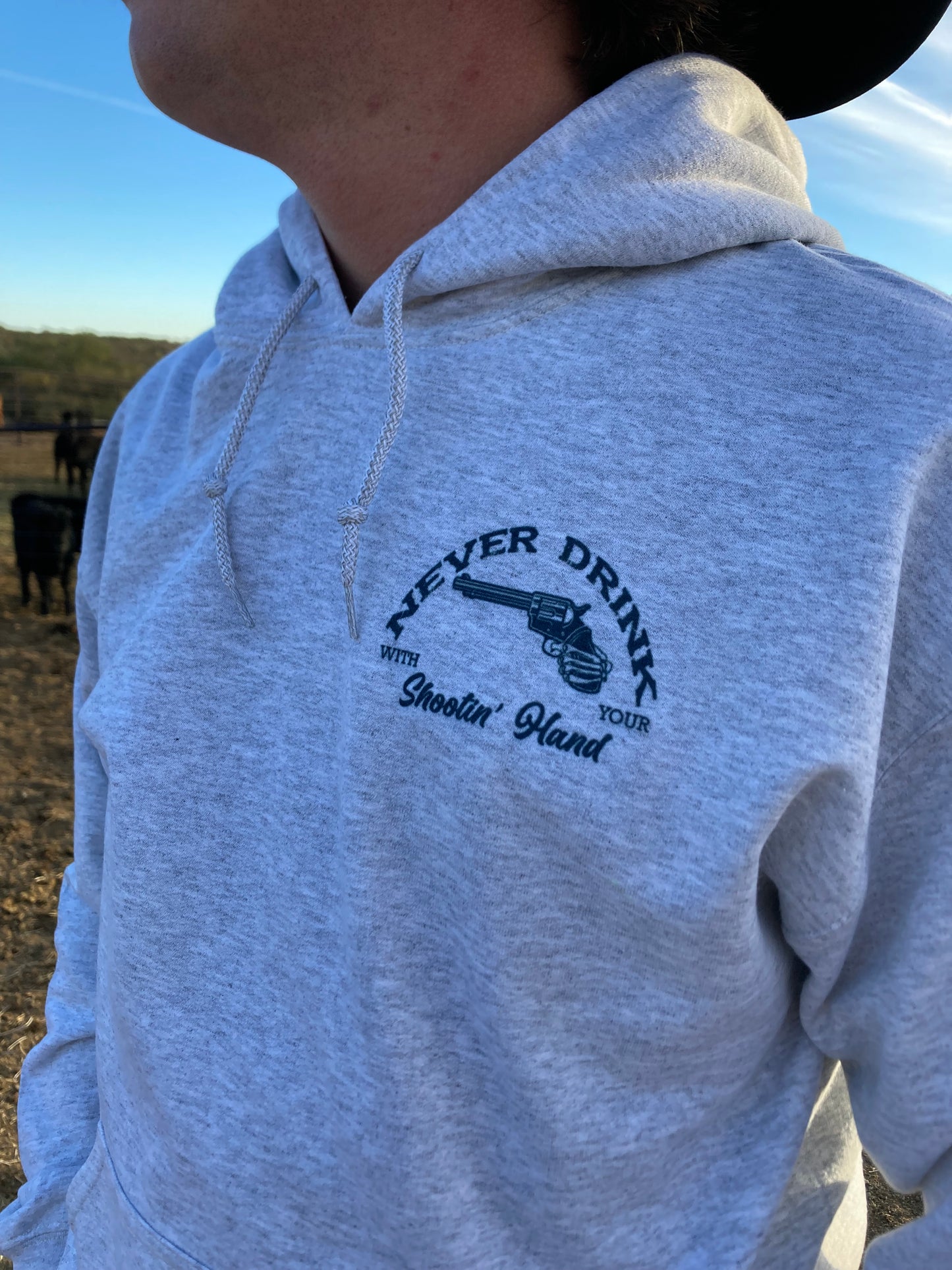 Never Drink With Your Shootin’ Hand Western Hooded Sweatshirt