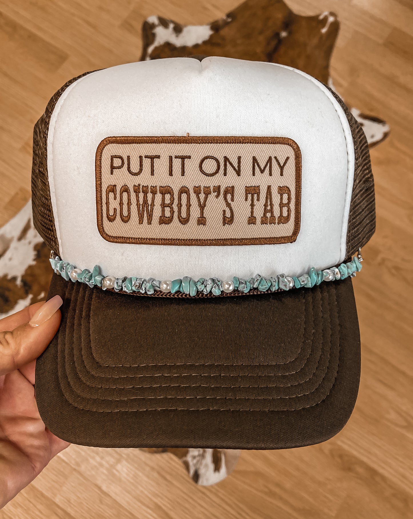 Put It On My Cowboy’s Tab Trucker Hat