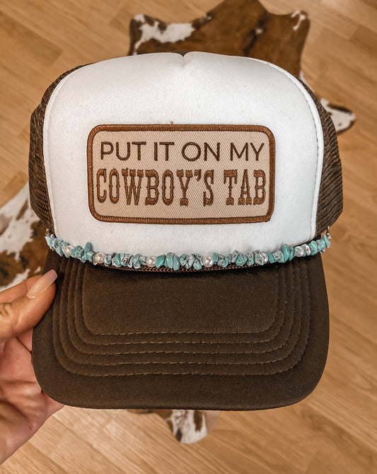 Put It On My Cowboy’s Tab Trucker Hat
