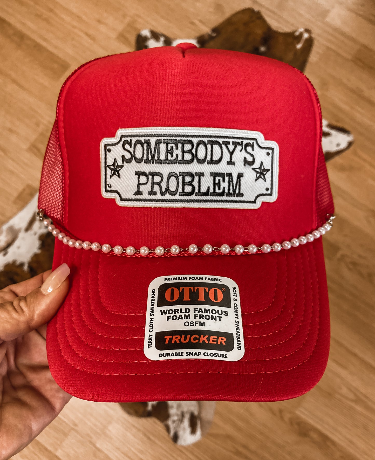 Somebody’s Problem Trucker Hat