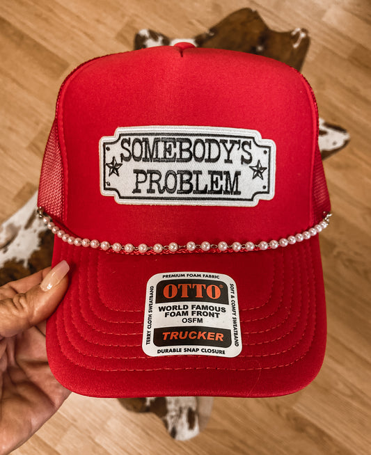 Somebody’s Problem Trucker Hat